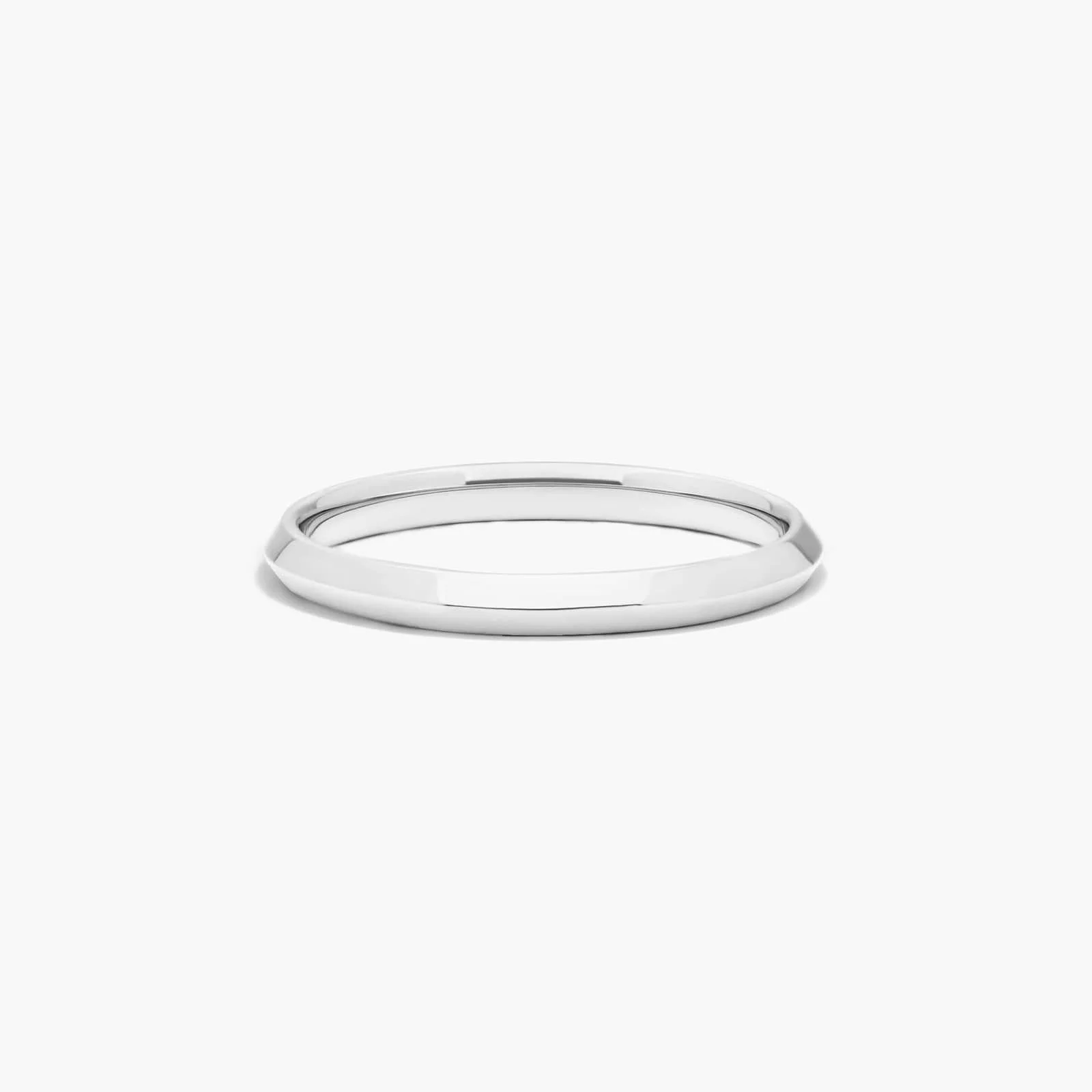 A minimalist silver and white bracelet on a plain white background.