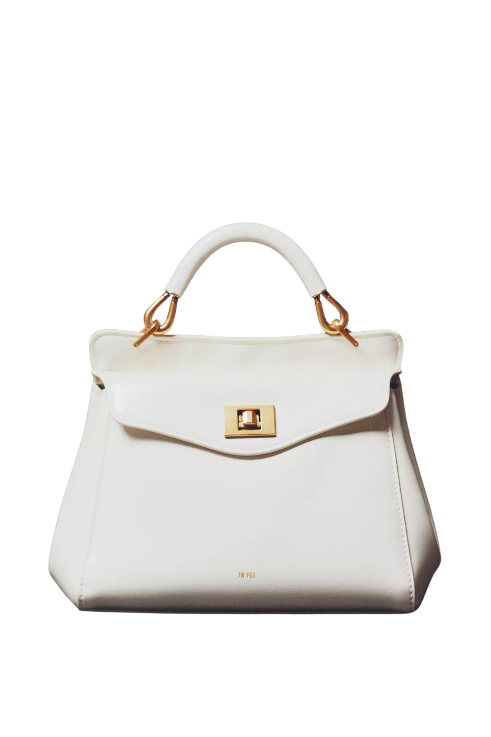 White handbag with gold hardware isolated on black background.