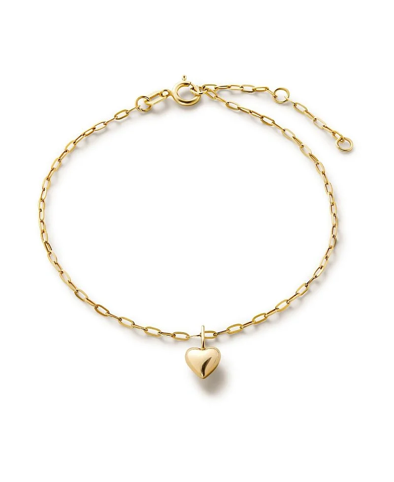 Gold chain necklace with a heart-shaped pendant.