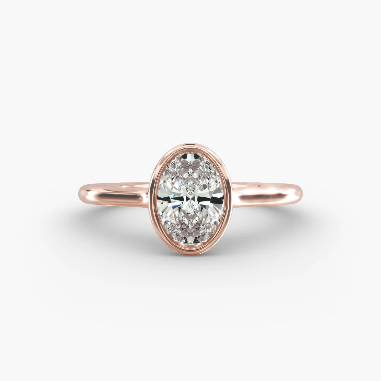 Rose gold ring with an oval-shaped diamond at the center