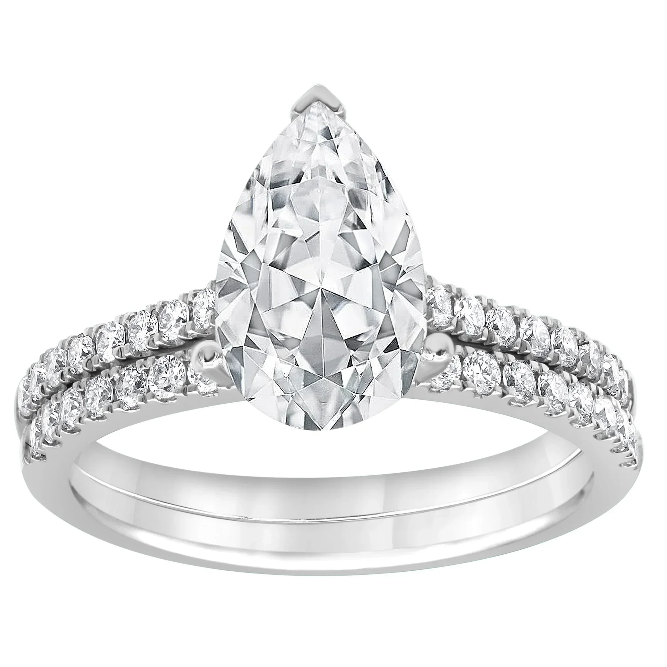 A silver ring with a large pear-shaped diamond center and smaller diamonds on the band.
