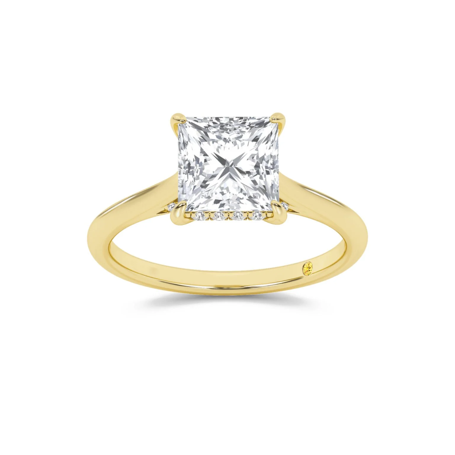 Gold ring with a large square-cut diamond and smaller diamonds along the setting.