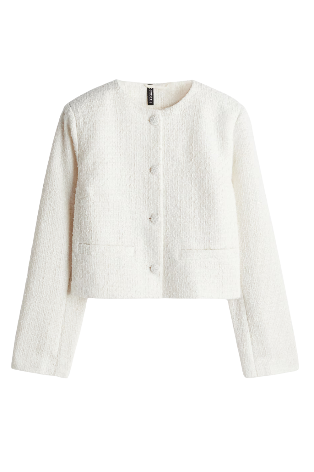 A white textured cardigan sweater with button closures and two front pockets.