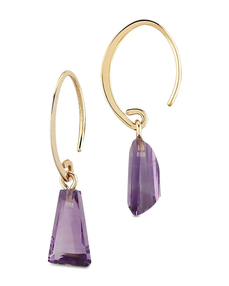 Gold hoop earrings with purple gemstone pendants.