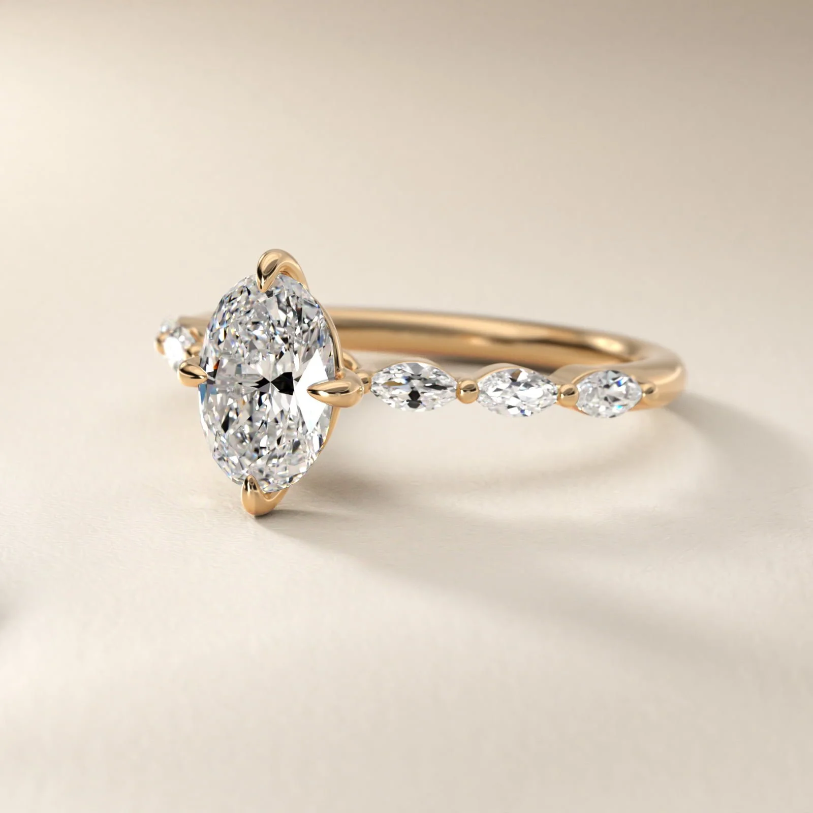 Gold ring with a large oval diamond center and smaller diamonds along the band, displayed on a plain background.