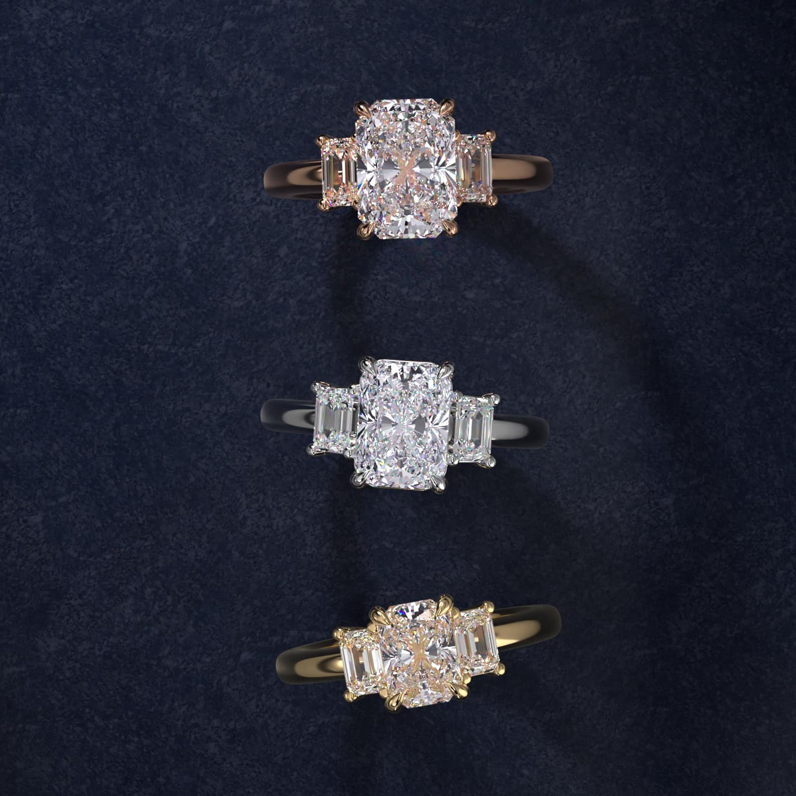 Three diamond rings, one with a large central oval diamond flanked by emerald-cut diamonds, set in gold, silver, and mixed bands, arranged vertically on a dark textured background.