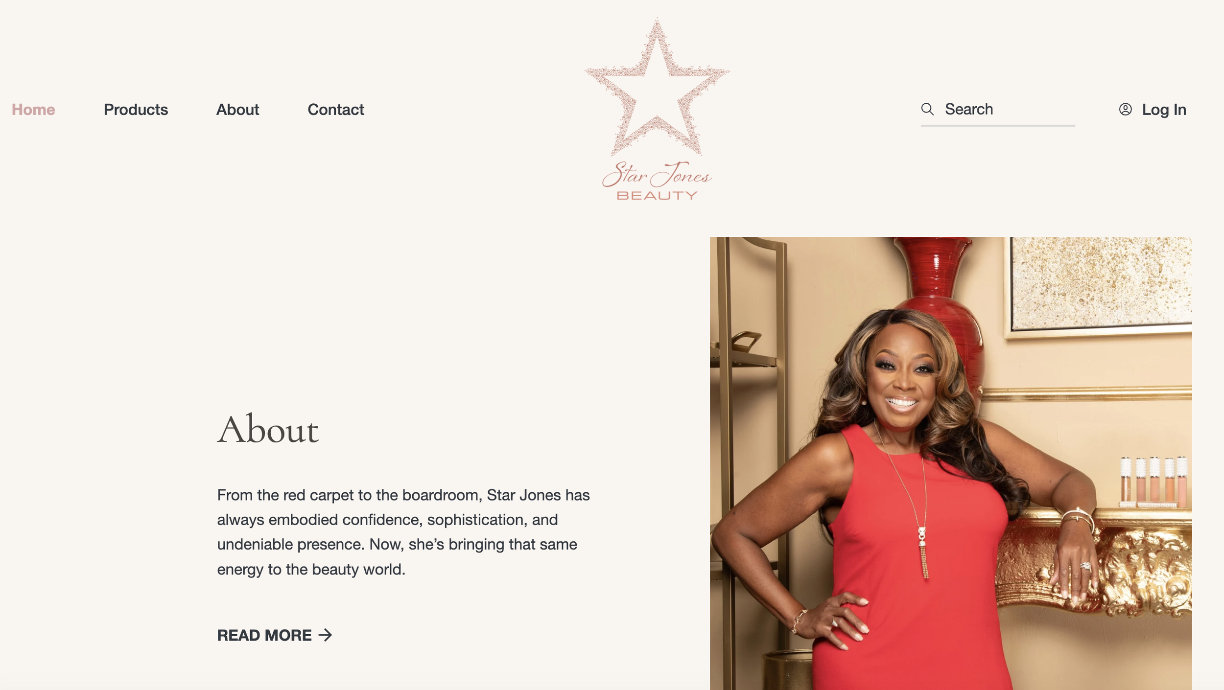 About page sample of Star Jones Beauty website featuring founder, Star Jones, in a red dress with a golden armchair and gold decorative elements in the background.