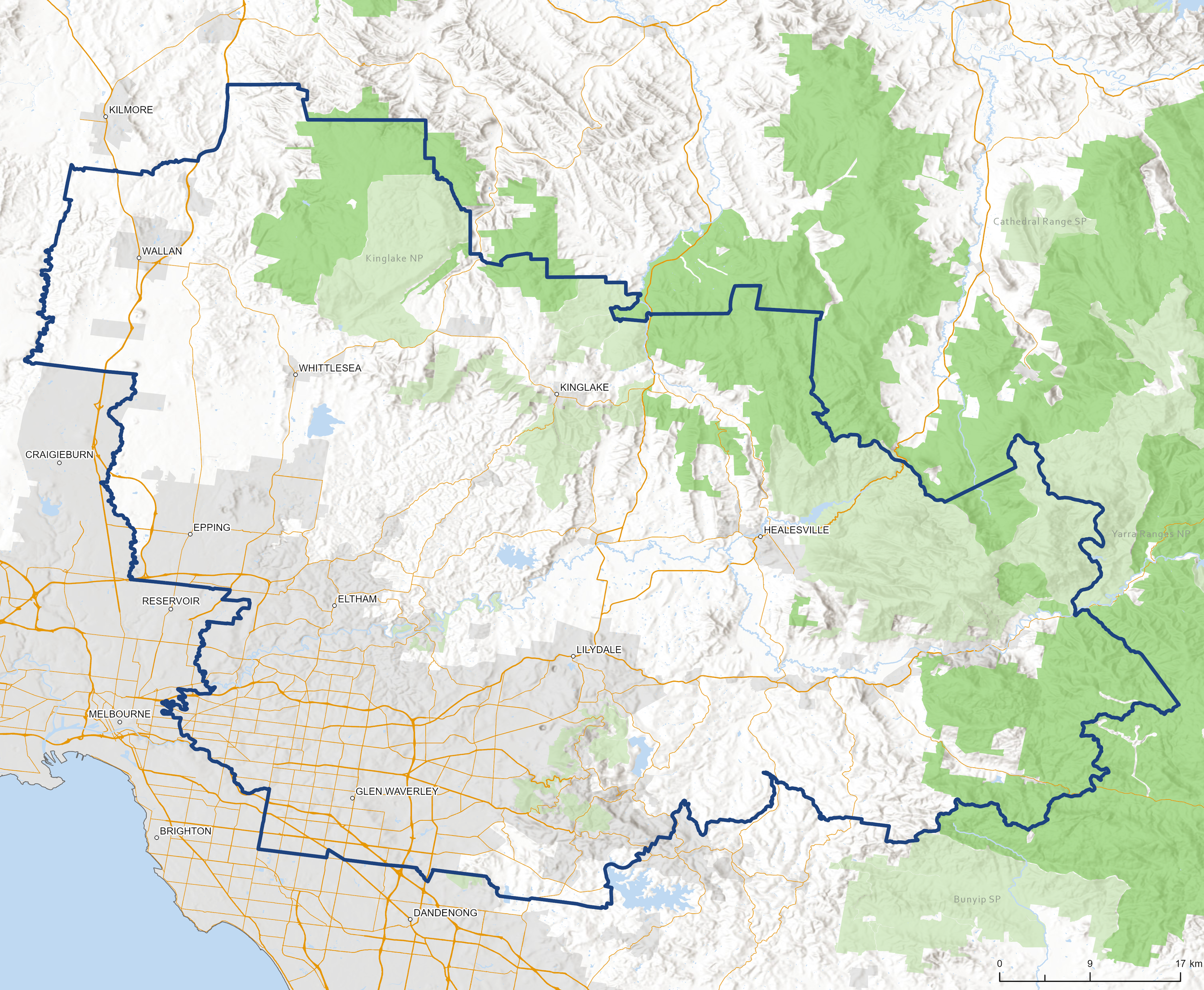Map showing a border with a blue line, green parks and forests, orange roads, and various town and city names including Melbourne, Dandenong, Lilydale, Healesville, and others in the region.