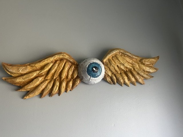 Paper mâché eye with wings