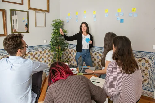 eam of professionals attending a wellness workshop, promoting healthy habits in the workplace