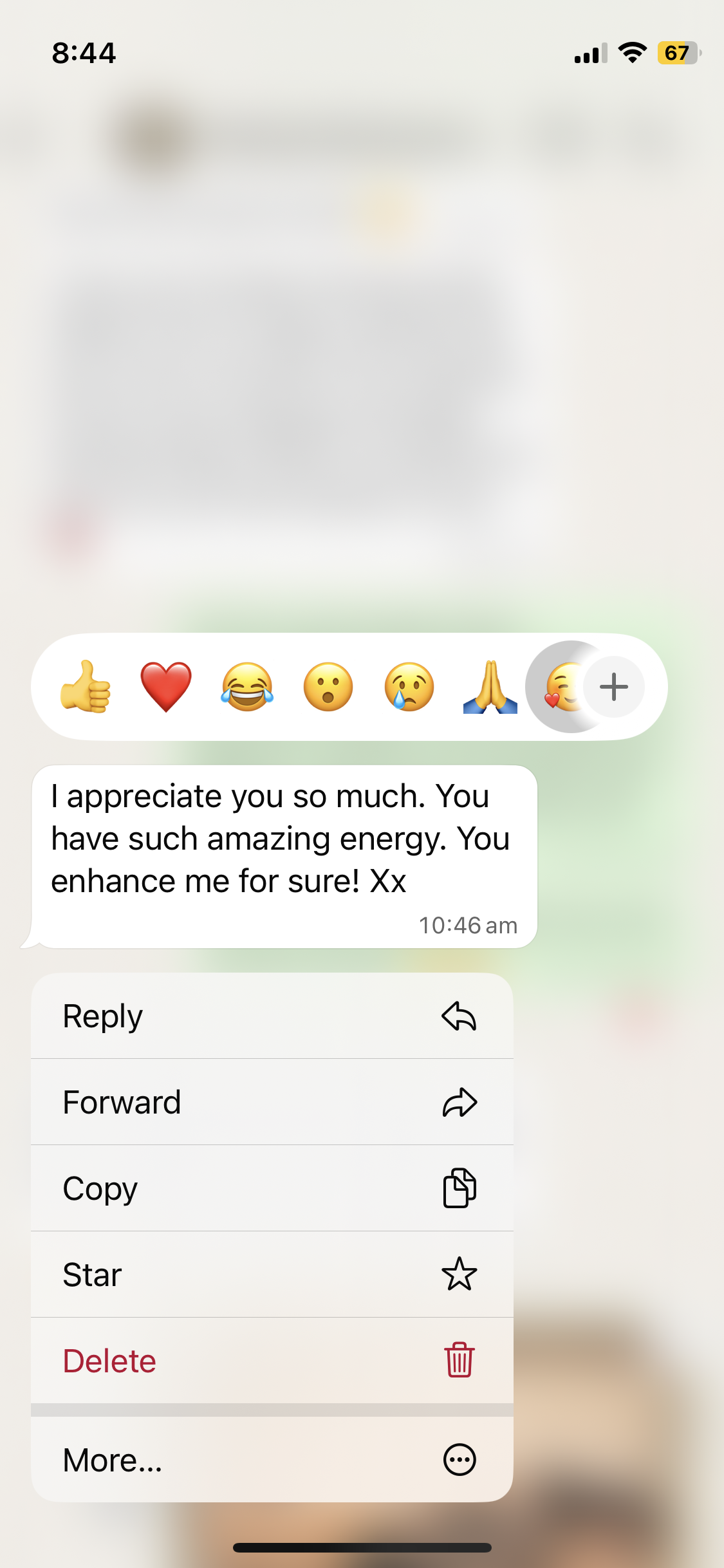 A screenshot of a messaging app on a smartphone showing a message that says, 'I appreciate you so much. You have such amazing energy. You enhance me for sure! Xx' with emojis and options to reply, forward, copy, star, delete, or more.