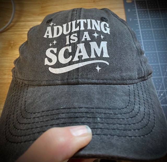 Adulting Scam Hat.png
