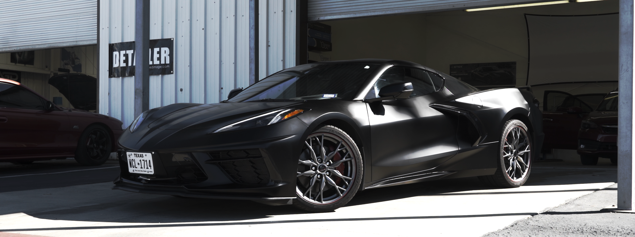 C8 Corvette Stingray wrapped in satin black colored paint protection film (colored PPF)