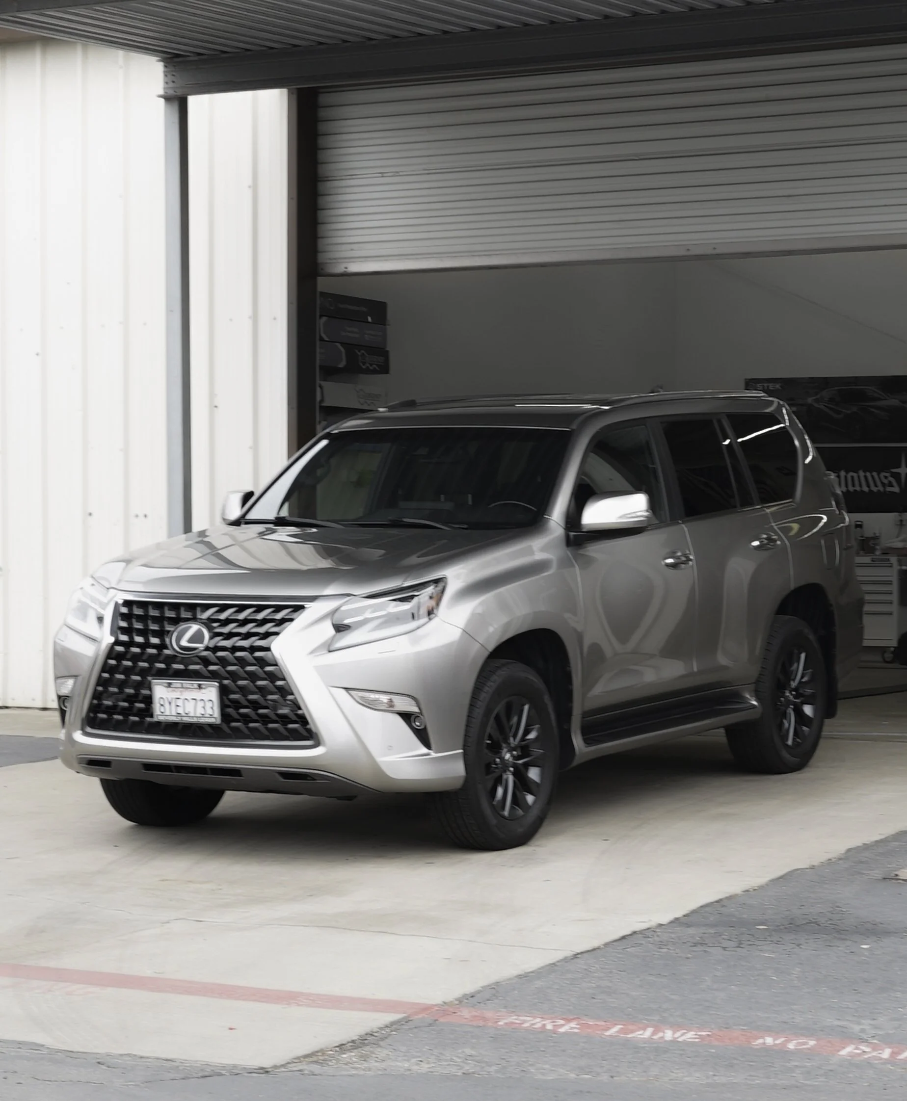 A silver Lexus SUV polished and ceramic coated with a 5 year ceramic coating