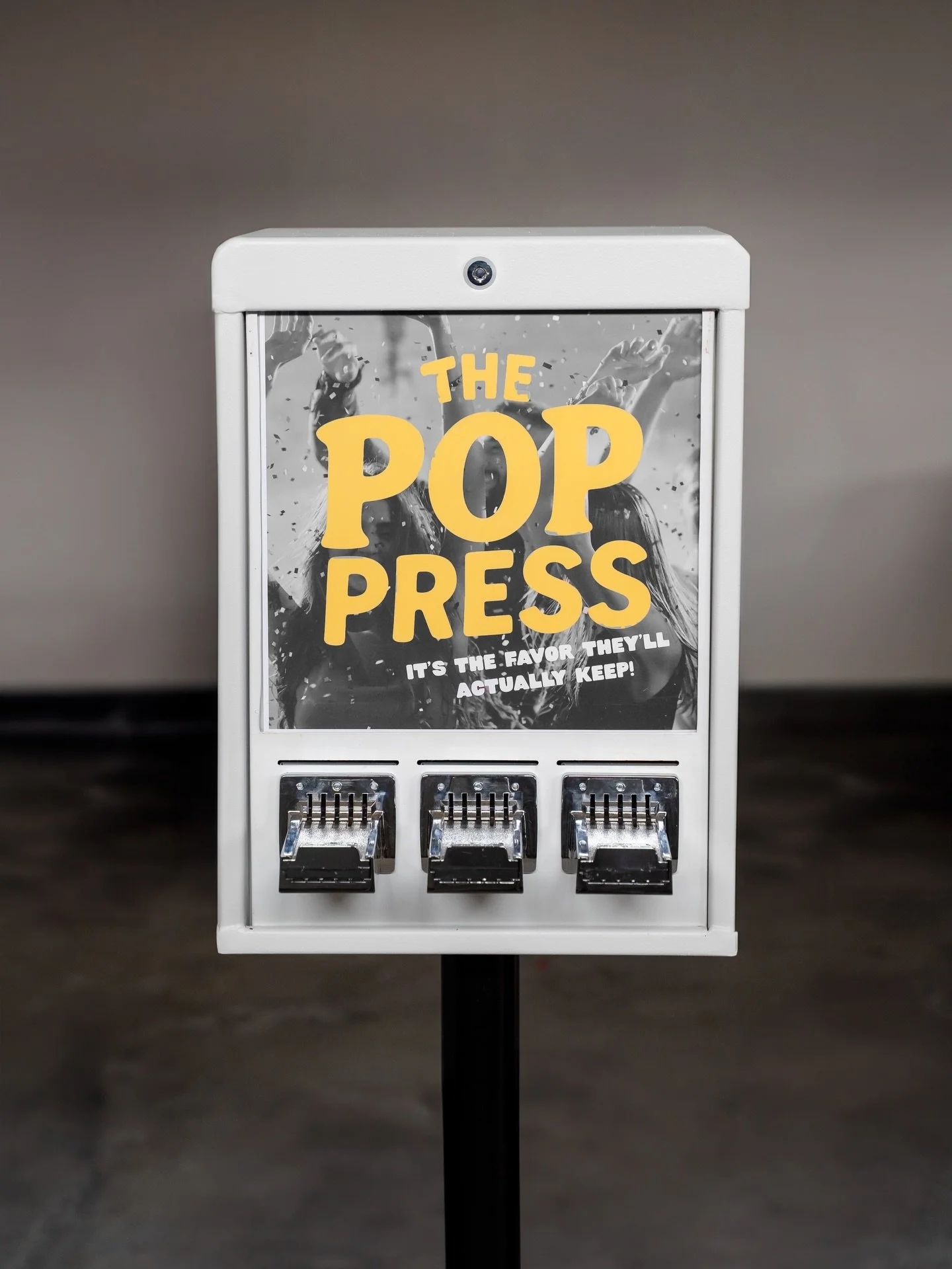 We&rsquo;re back with a fresh coat of paint!

We painted The Pop Press white so it can blend seamlessly into any aesthetic. Black tie wedding, backyard party, brand launch, you name it.

The Pop Press is our rentable vending machine that dispenses:
&