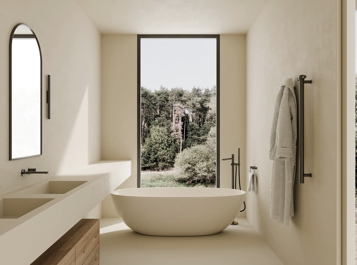 Modern minimalist bathroom with a freestanding bathtub, a large window showing trees outside, a wall-mounted mirror, and a wooden vanity with two sinks.