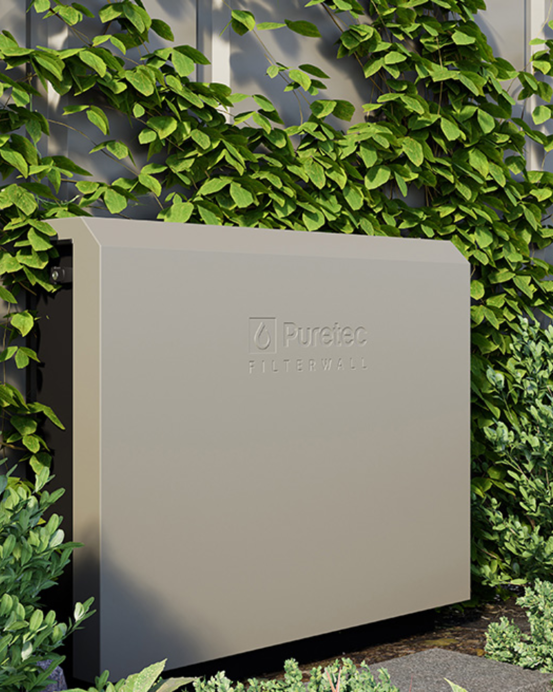 A Puretec Filterwall unit outdoors surrounded by green leafy plants.