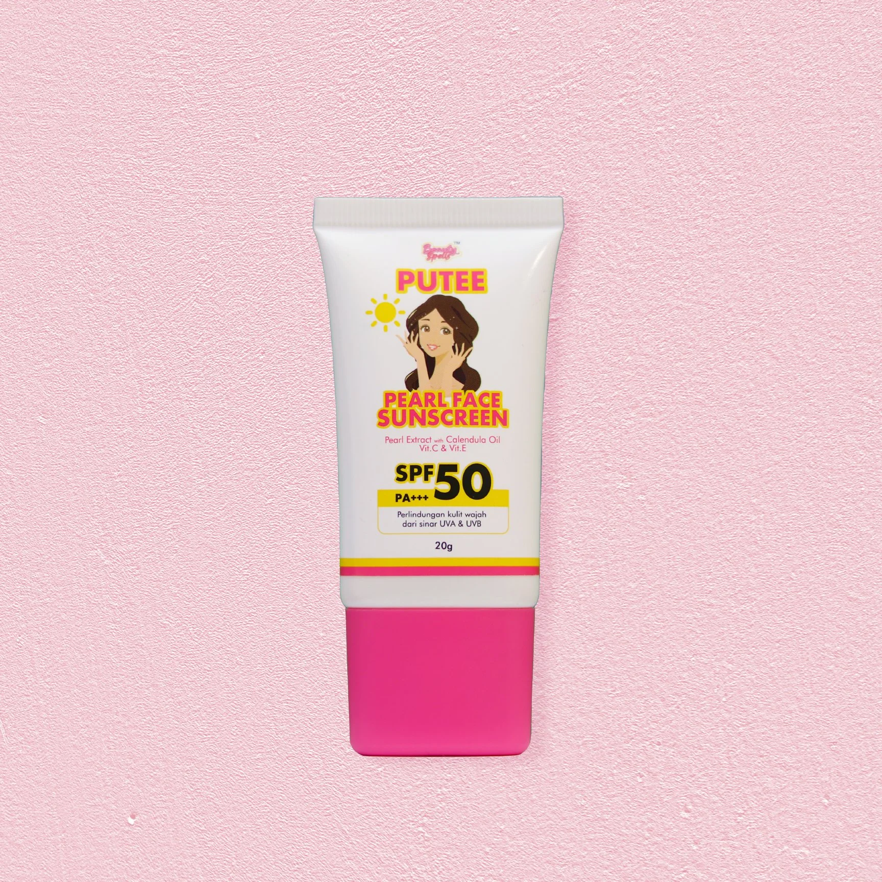 A tube of Putee Pearl Face Sunscreen with SPF 50, PA+++ on a pink textured background.