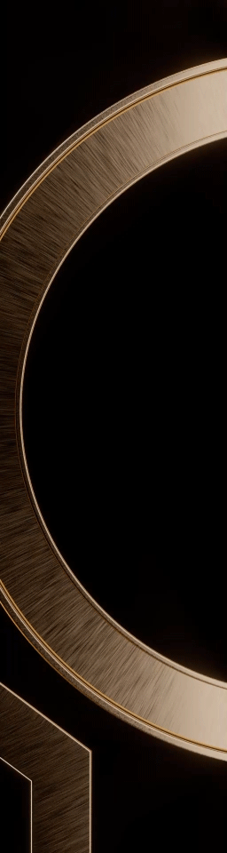 Close-up of a gold and black circular metallic object, possibly a ring or component.