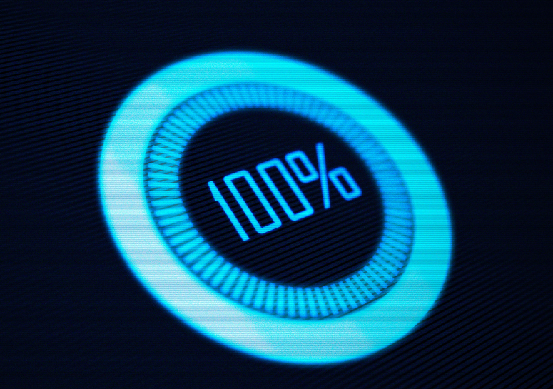Digital progress circle showing 100% completion with a blue glow.