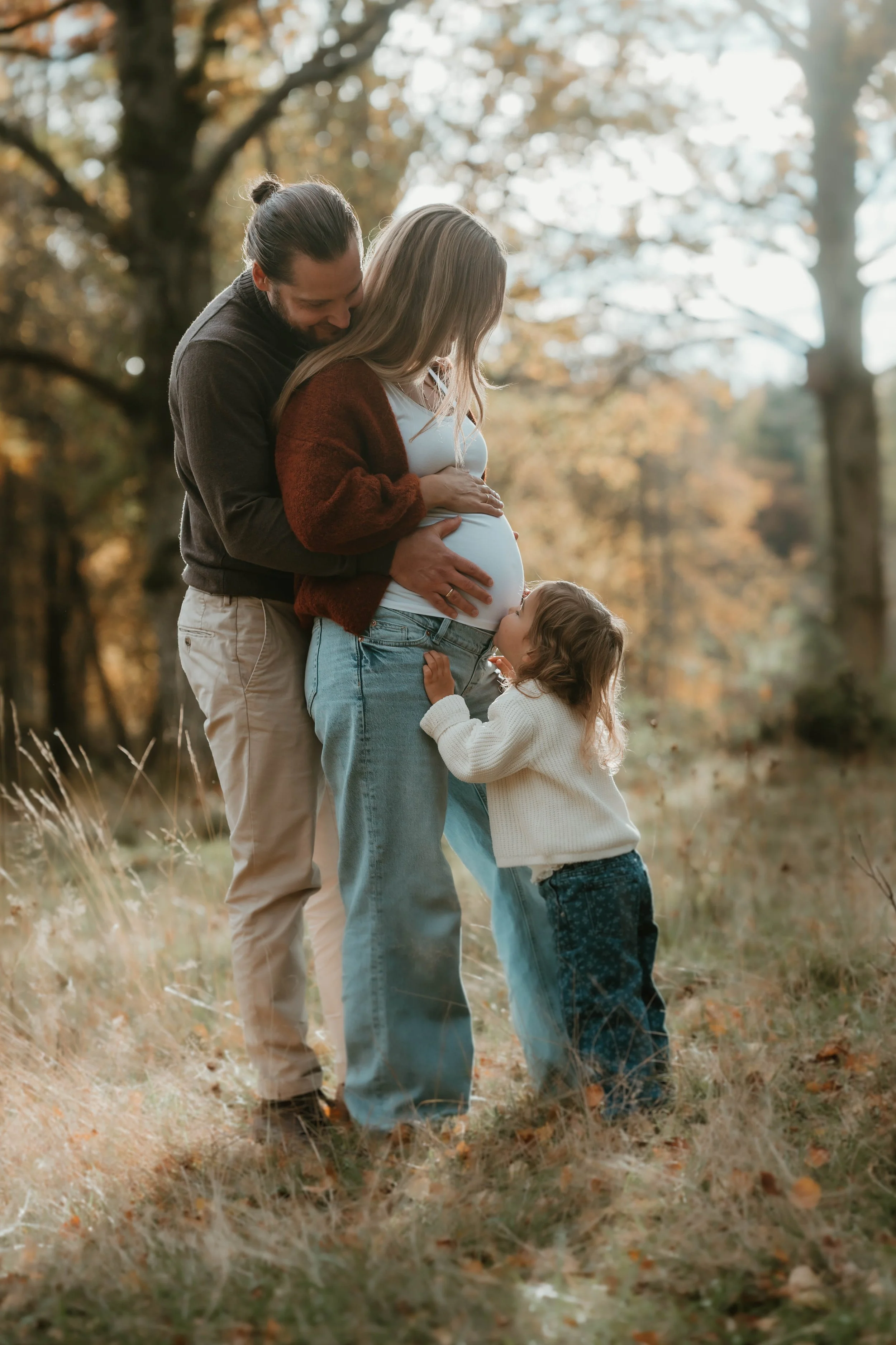 Gravidfotografering med familie og forventning