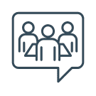 Icon of three people sitting in a meeting or discussion, inside a speech bubble. Representing a council.