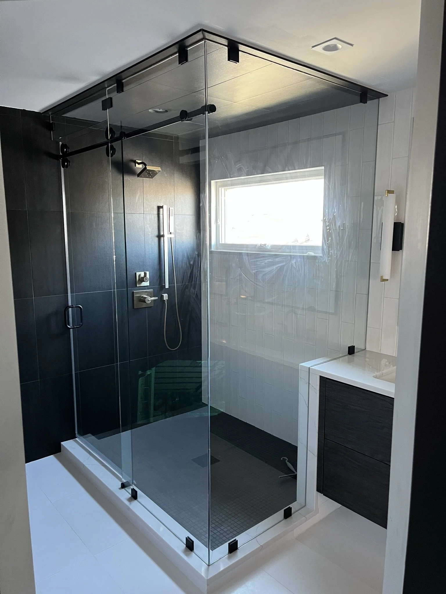 Modern glass-enclosed walk-in shower in Boulder, Co