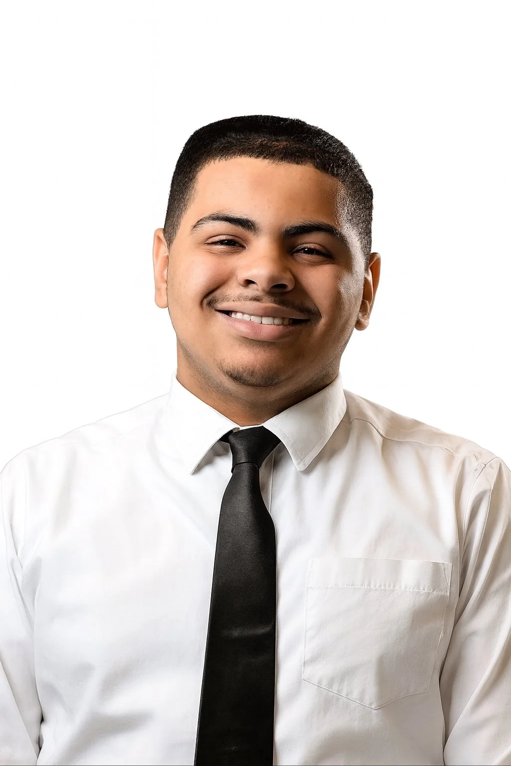 A smiling man wearing a white dress shirt and black tie against a plain white background.