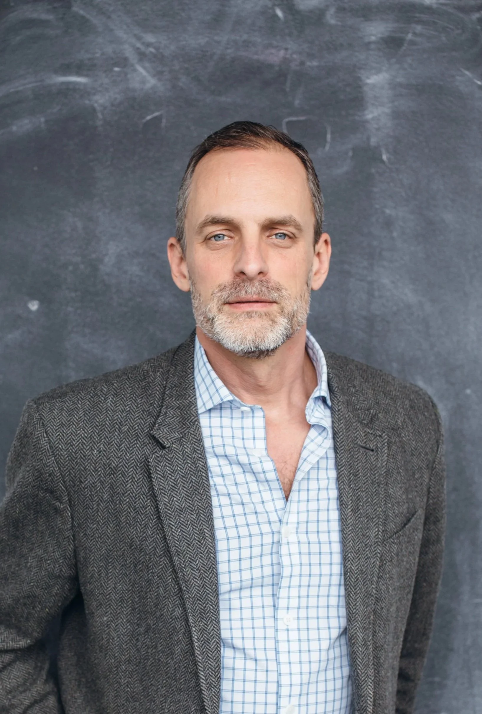 Evin Dosdall with graphic design students and team members – mentor and art director