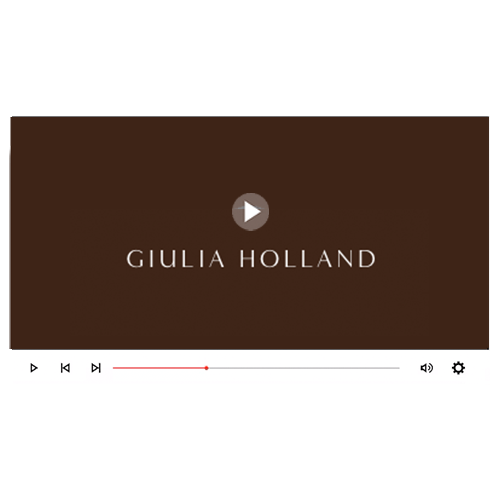 Video player screen displaying the name Giulia Holland on a brown background.
