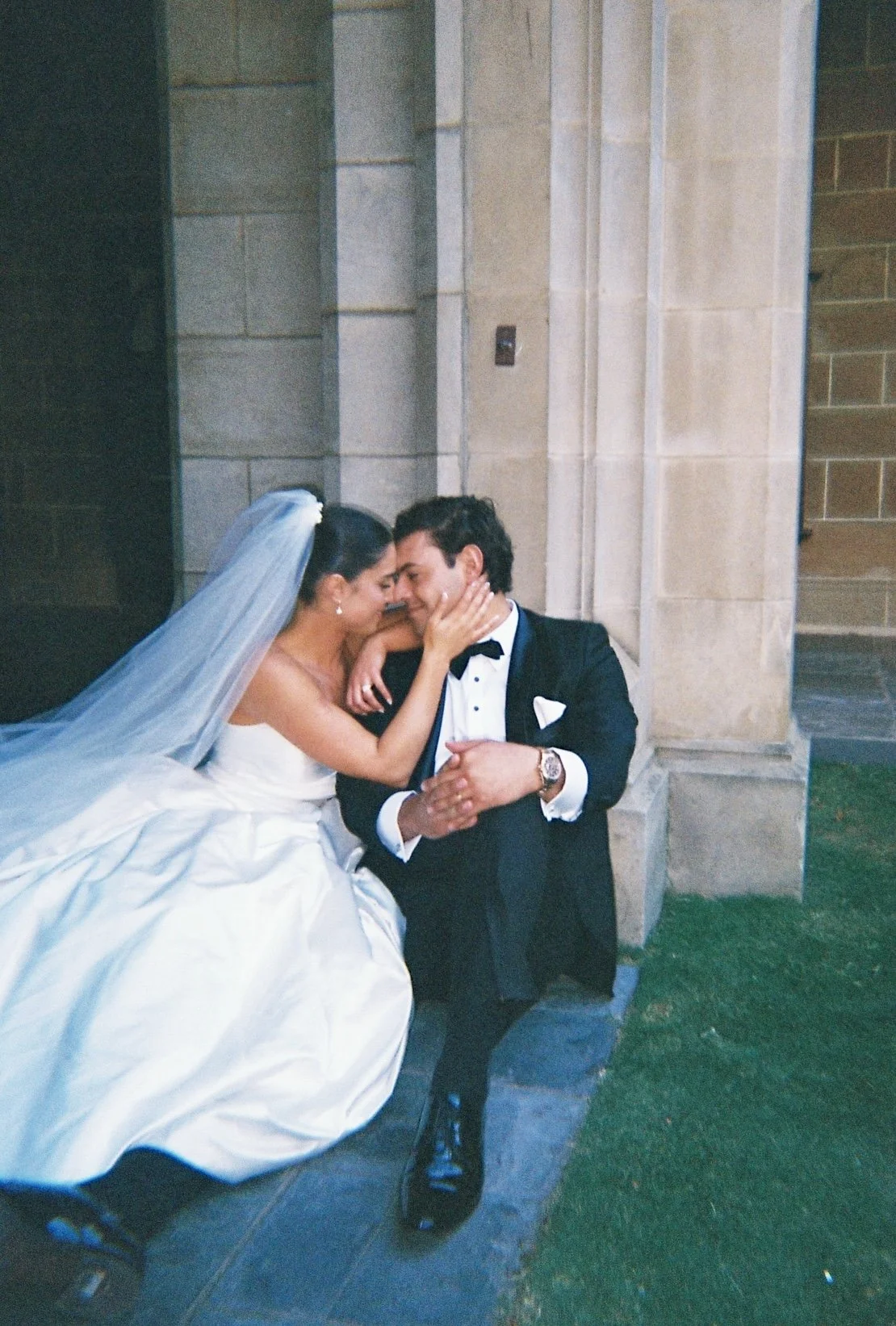 Laurie’s customers, Fernando and Kate embracing by the lake on their wedding day.