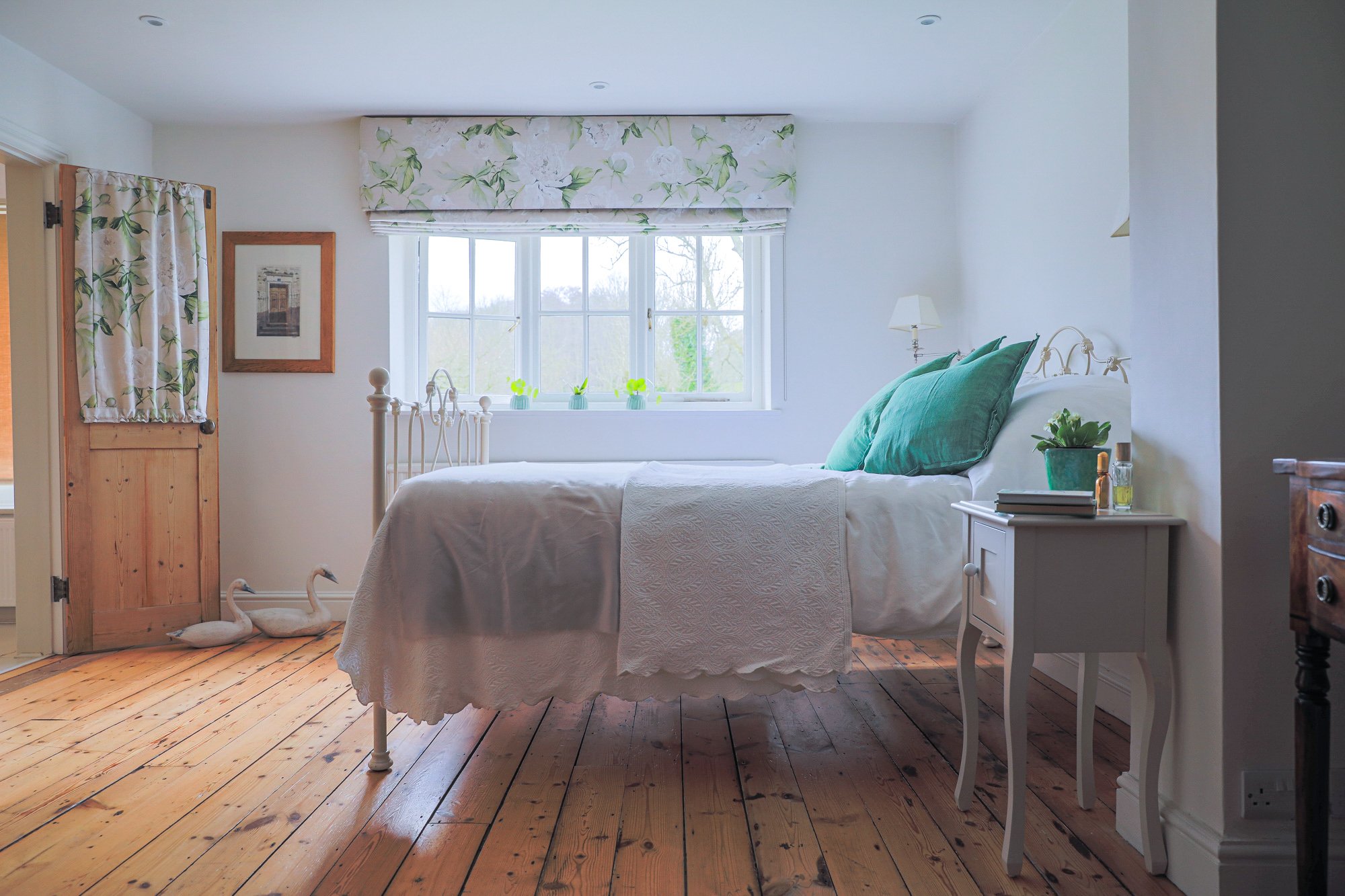 Bright photograph looking into a bedroom in East Sussex
