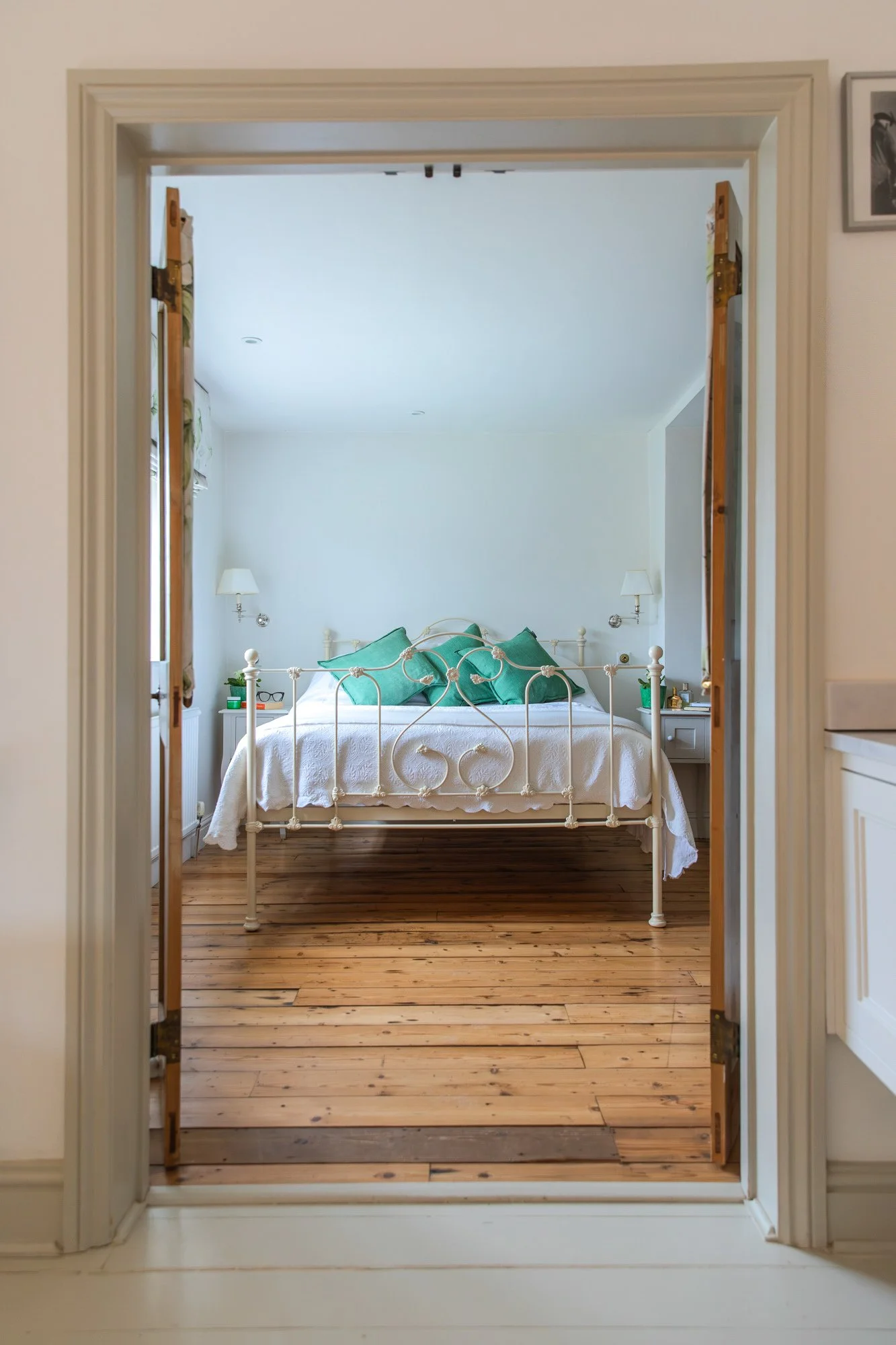 Bright photograph looking into a bedroom in East Sussex