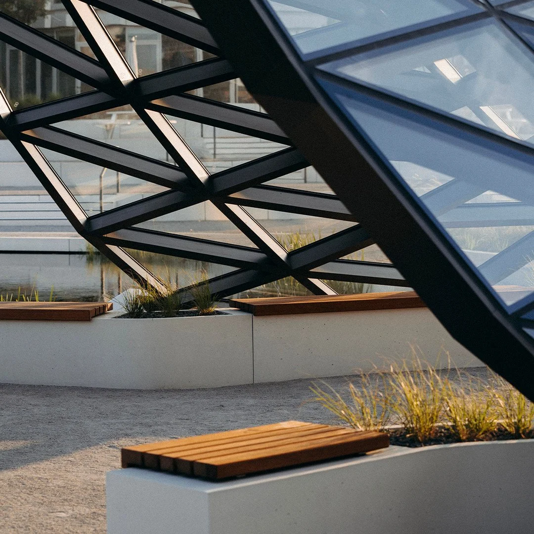 For the campus installation the shell was completed glazed and sealed, so it works perfectly as a pavilion protecting visitors from the sun or the rain. It sits so comfortably in next to the pool in the new landscaping that everyone remarks that it l
