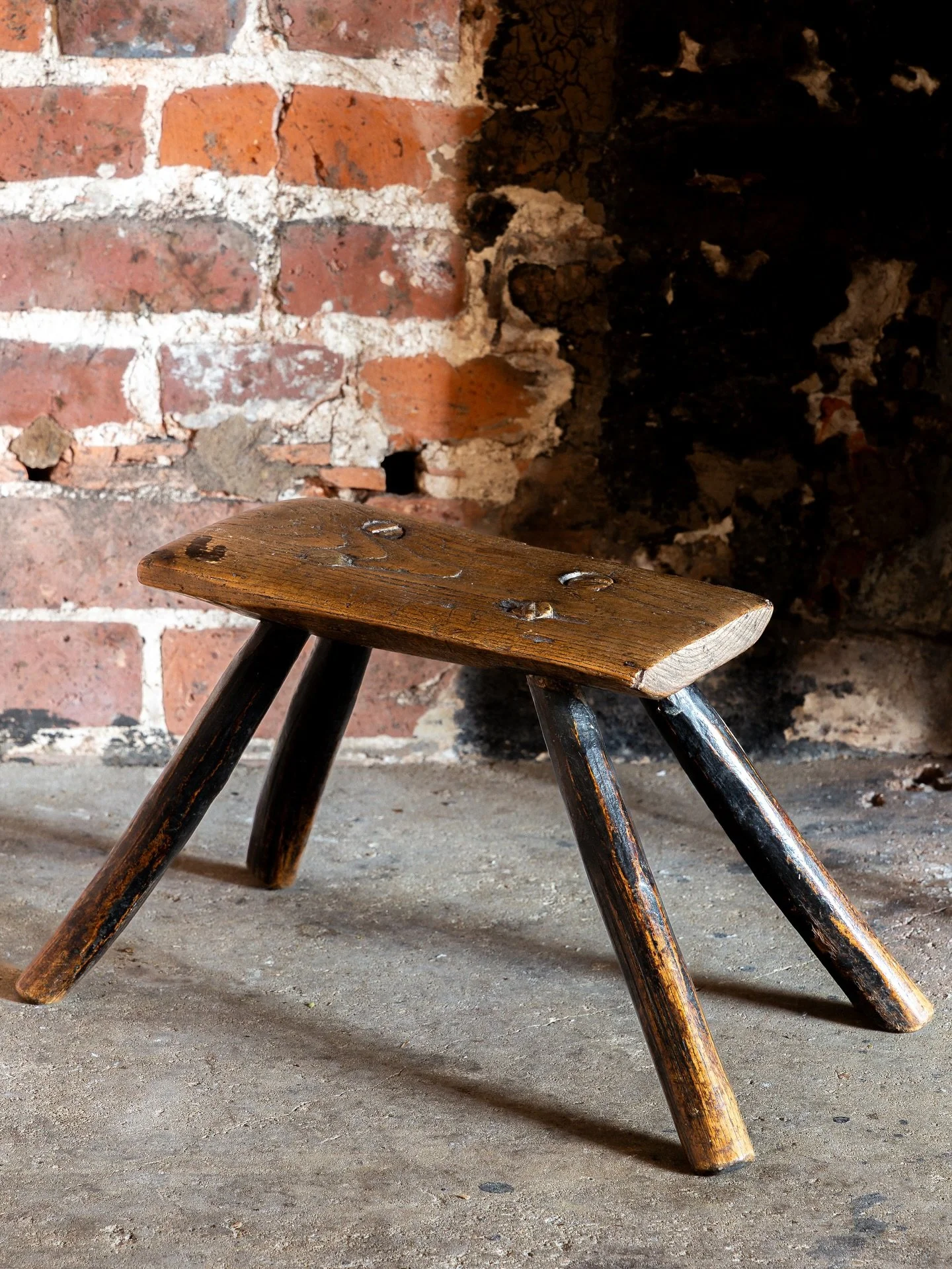 A very attractive 18th Century Primitive Welsh stool, in elm and ash, with beautifully splayed hand carved legs. A favourite of ours.

Height 22cm
Width 29cm
Depth 13cm

DM for details