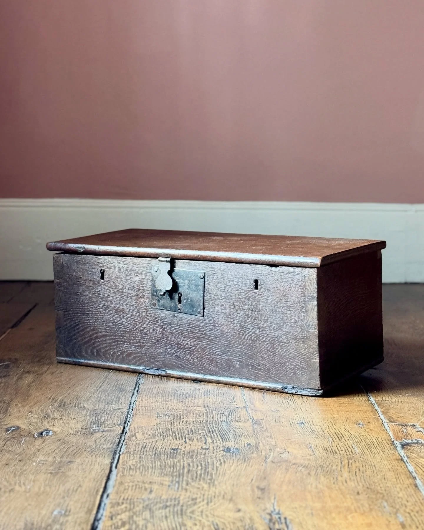 A small 18th Century oak church wardens chest made with thick planks. Sometimes it&rsquo;s the simplicity of an object which appeals to us and makes it special. There is something beautifully honest and humble about this one which has had centuries o