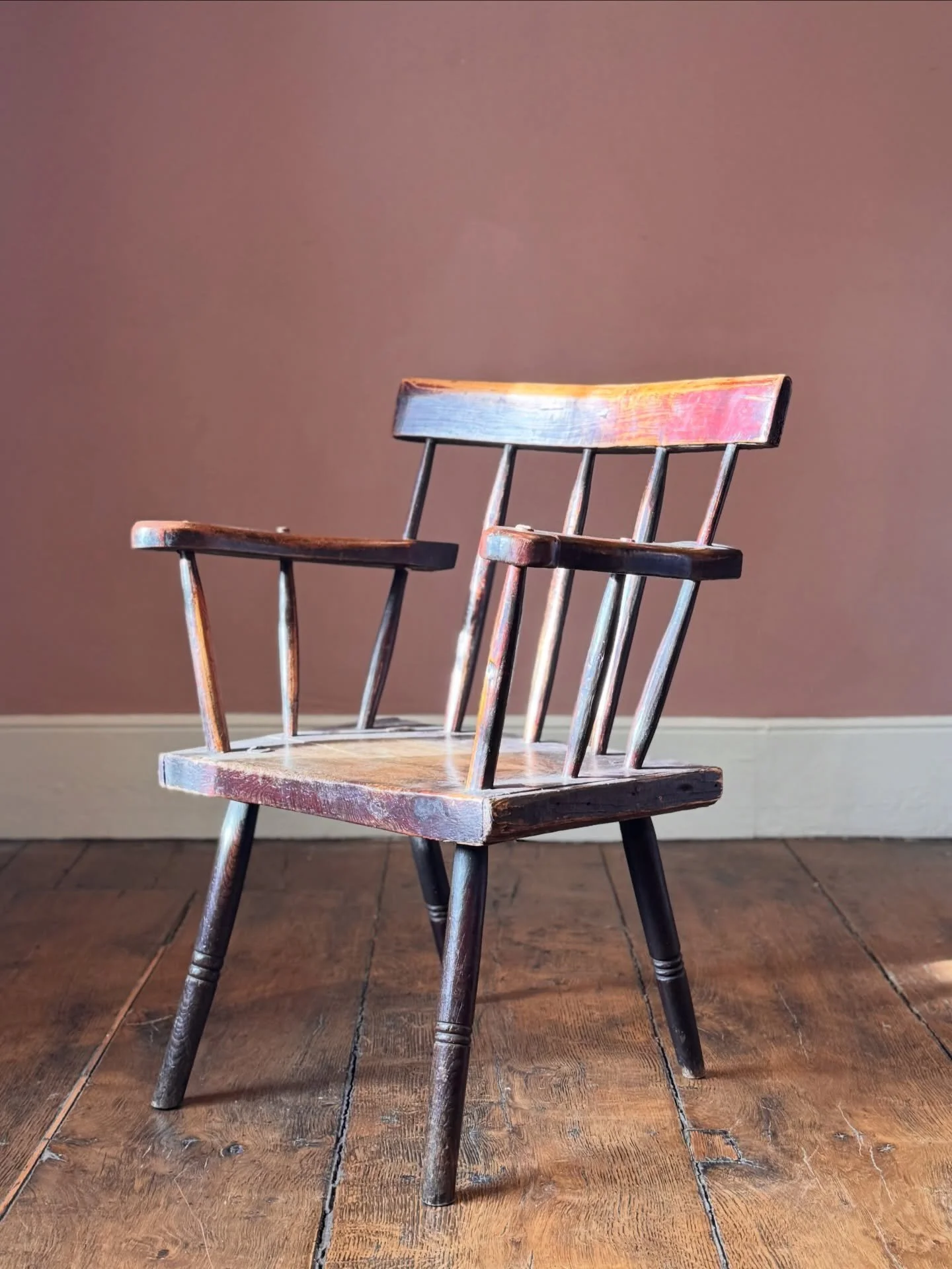 A beautiful early 19th Century Irish hedge chair, with remnants of the original dark red paint. Of good proportions this hedge chair is larger than most, very comfortable and sturdy enough for everyday use. A really good example of Irish vernacular f
