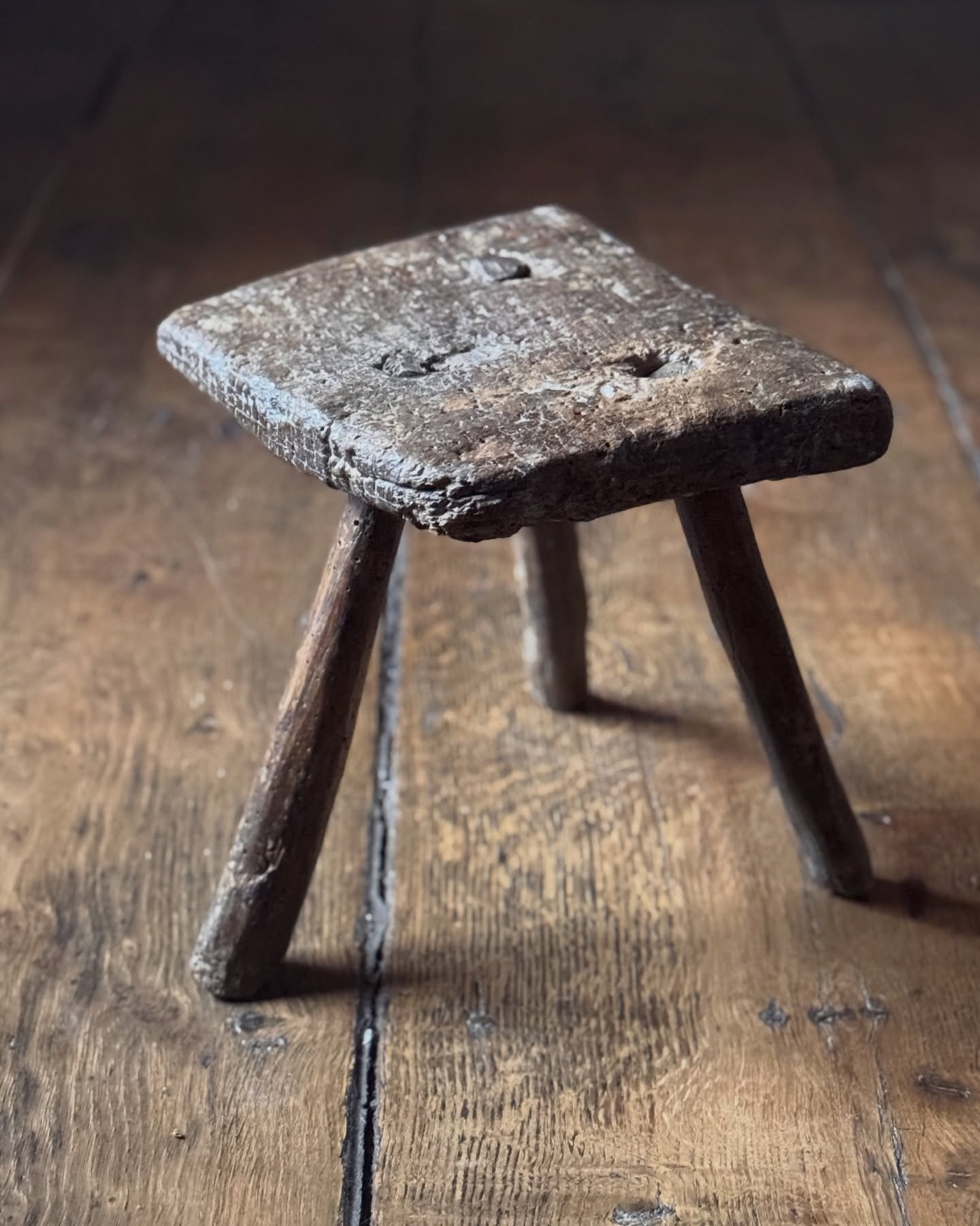 A very charming 18th Century Welsh milking stool with beautifully textured patina showing the history of use. With three splayed legs, it&rsquo;s got a great shape to it. 

Height 26 cm
Width 25 cm
Depth 29 cm
&pound;195

Now available to purchase on