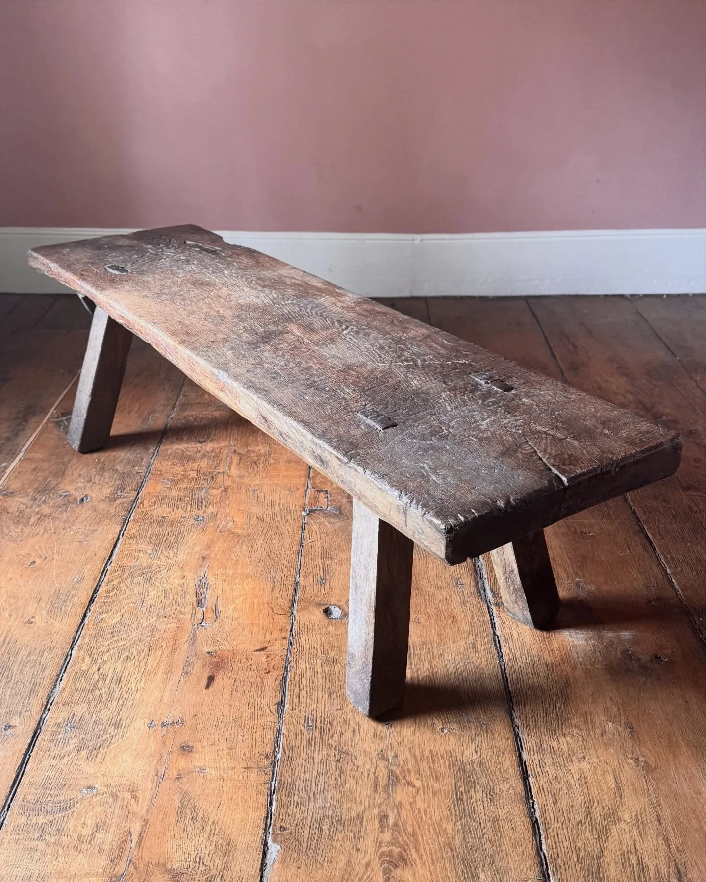 An excellent 19th Century oak big bench. Heavy, with a beautifully worn top showing over a century of use, this solid oak pig bench is ideal as either a large bench or a coffee table. A really good primitive piece of vernacular furniture. 

Height 47