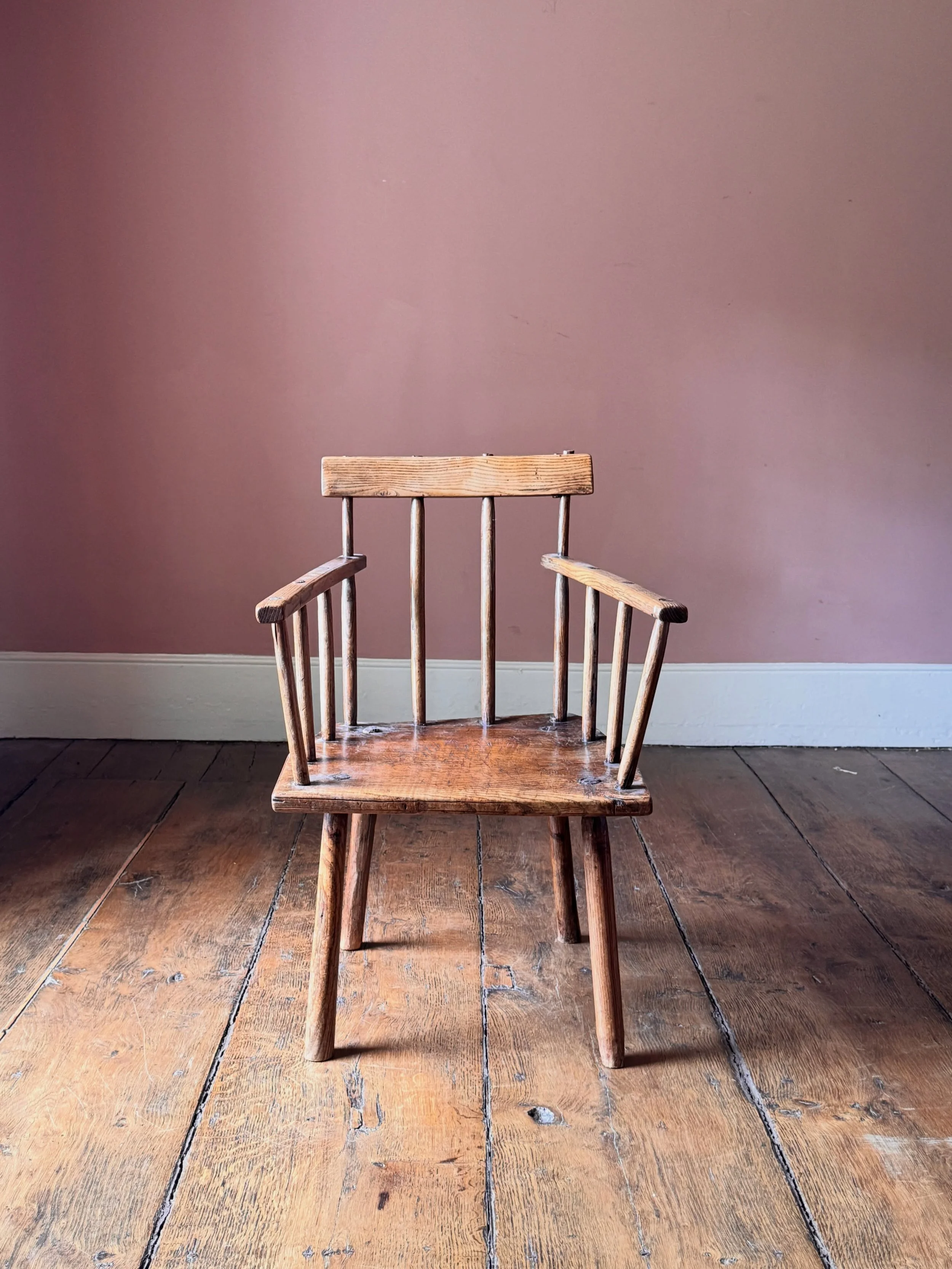 An attractive 19th Century Irish hedge chair with traces of historic paint. Good Irish hedge chairs are increasingly hard to find. Once considered by some to be the poor relations of their Welsh stick chair cousins, hedge chairs are now been being re