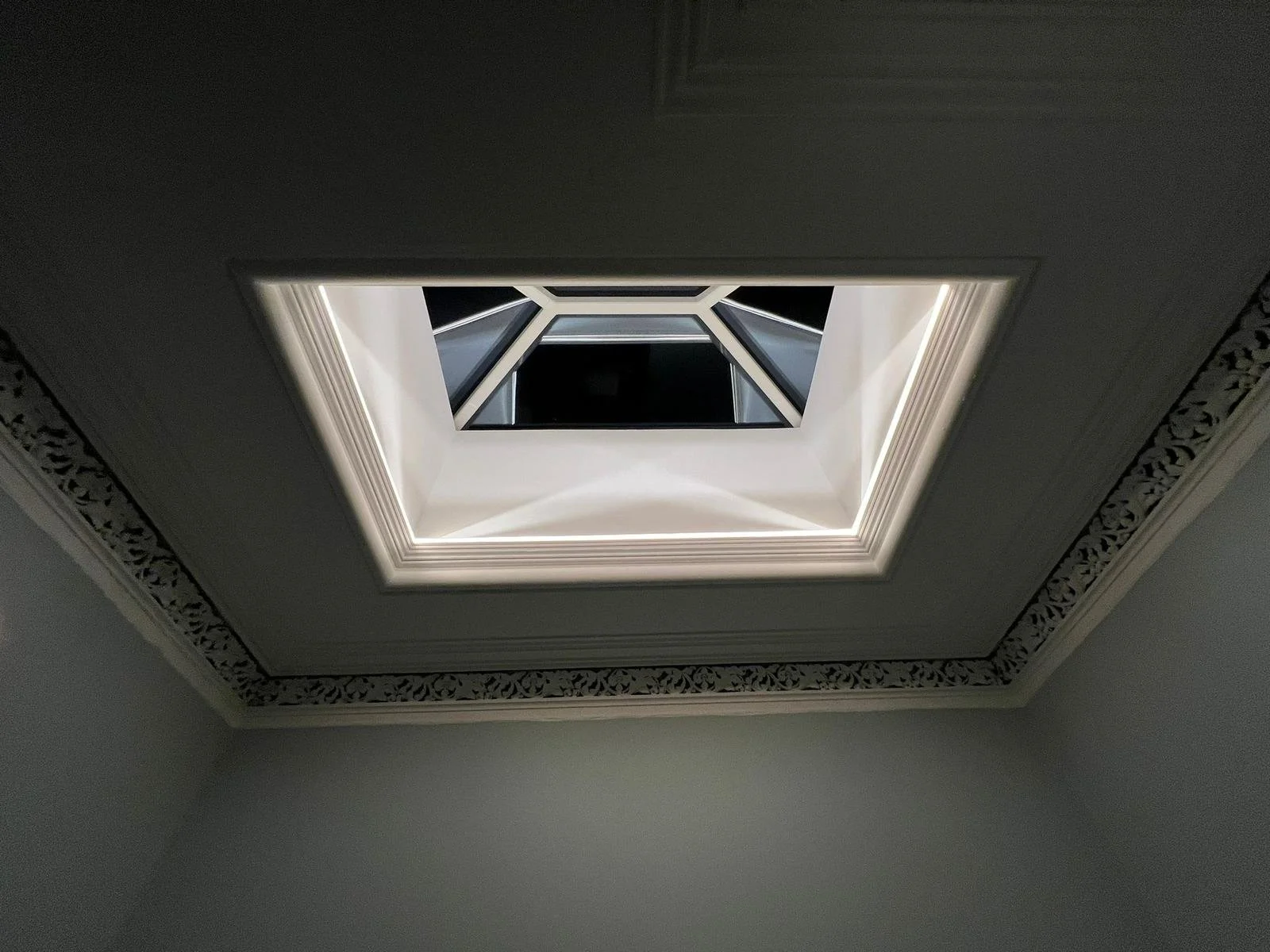 The stunning cupola at centred atop the two story main stair floods light through the interior of the property.