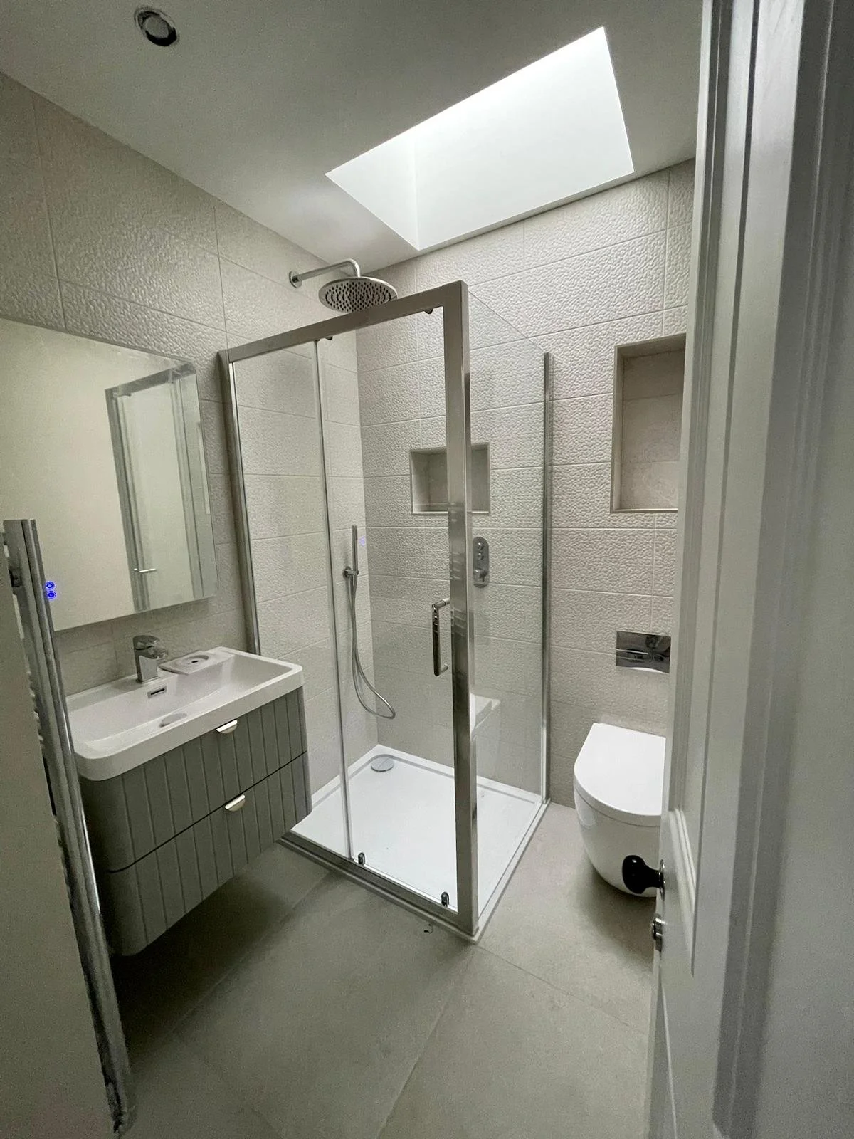 The second floor 'kids only' shower room with opening skylight to aid ventilation