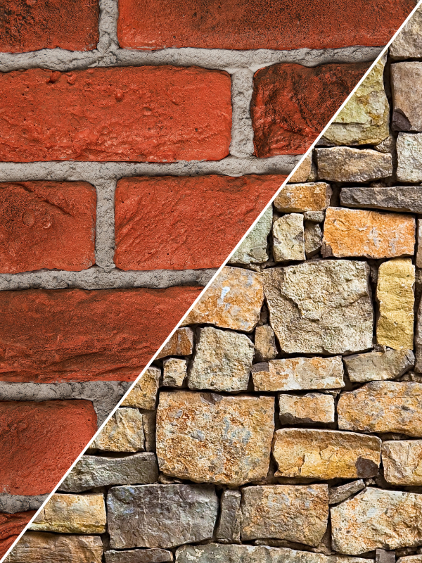 Traditional dry stone wall masonry texture alongside red brickwork showing fresh mortar pointing.