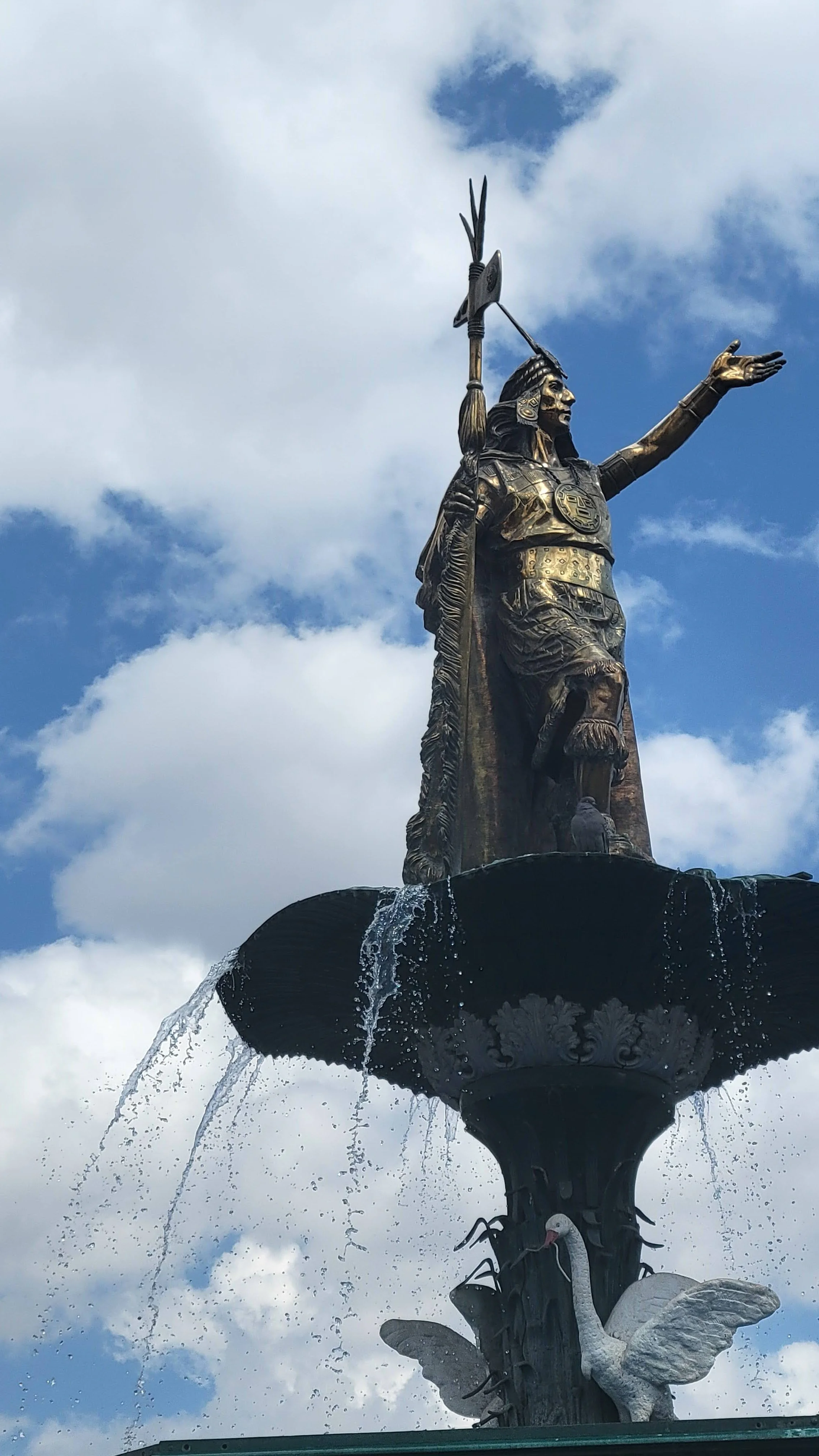 Statue atop the fountain in Plaza de Armas