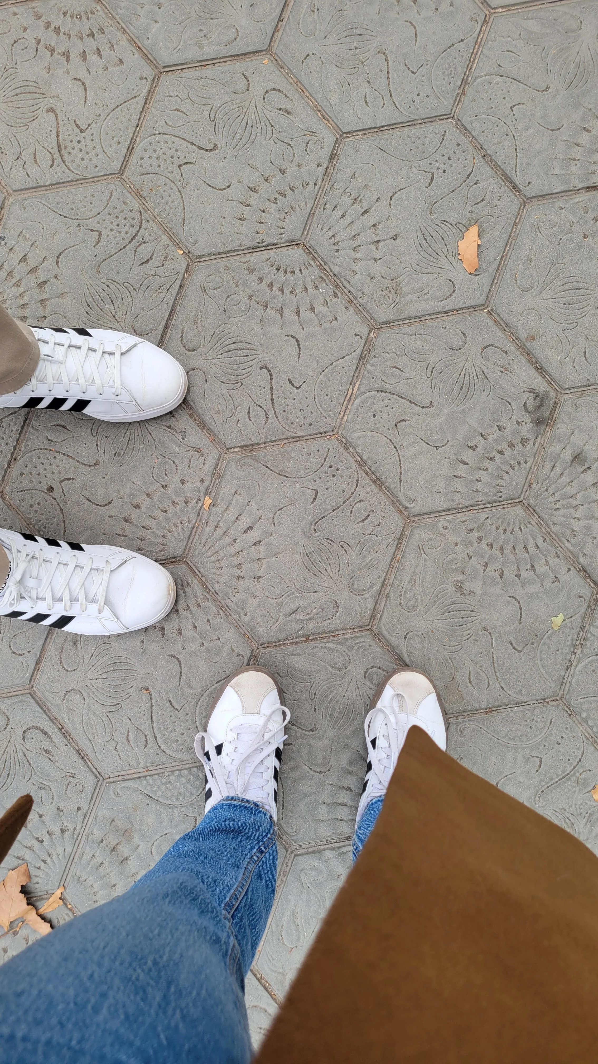 tiles on the street designed by gauid with floral and shell inspired patterns