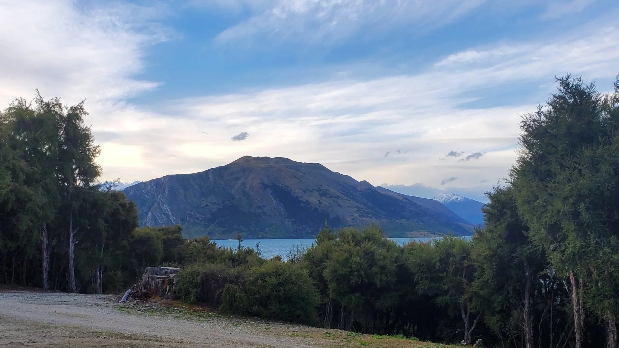 Mountain and blue lake from campsite in Wanaka