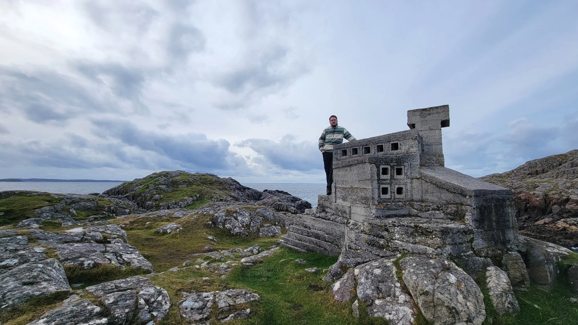 tyson standing next to hermit castle, only just taller than him
