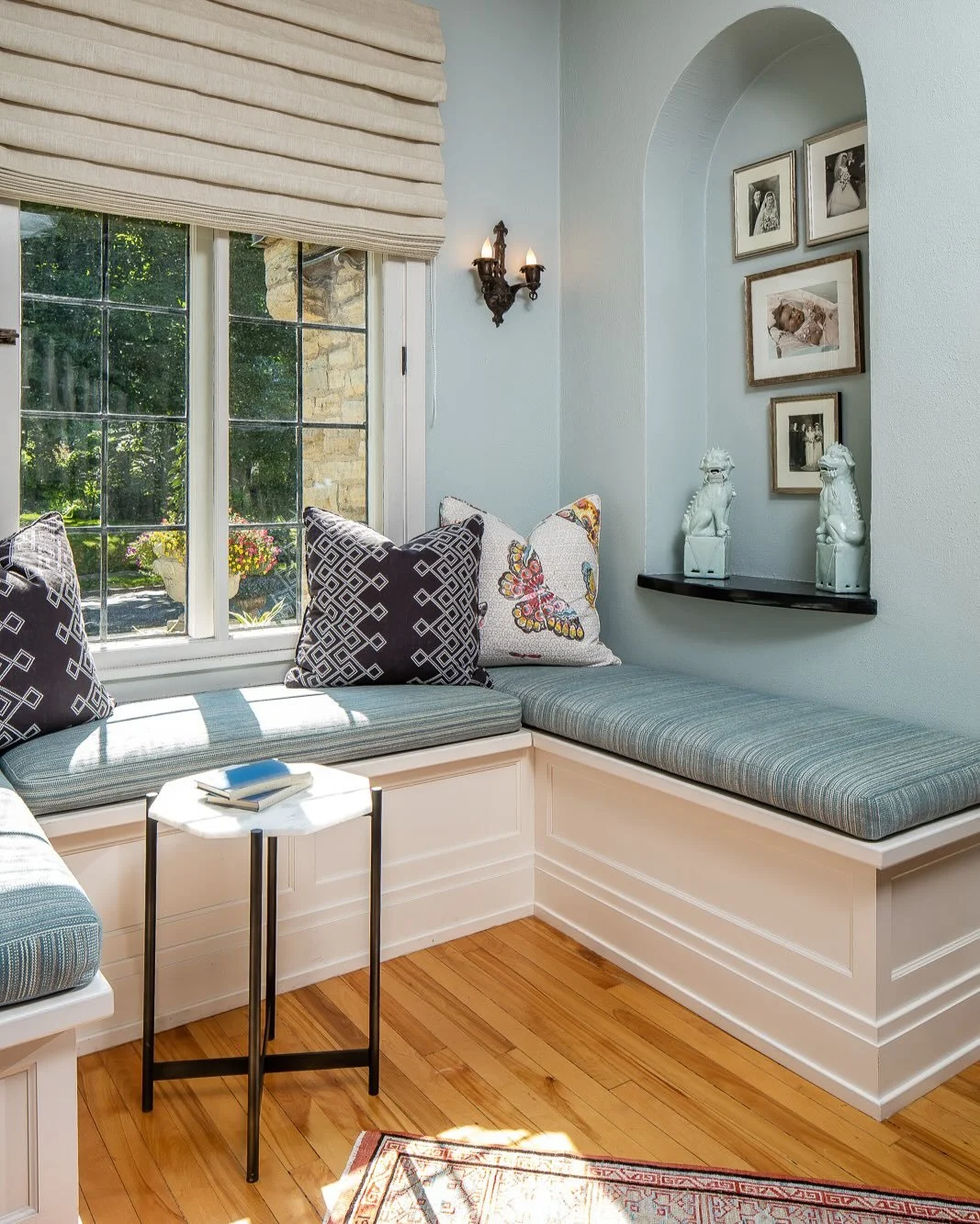 A custom-built-in window seat designed for quiet mornings, rainy day reads, and cozy summer afternoons. ☁️📖
With layered textiles, natural light, and a view to the garden, this reading nook blends comfort and charm in all the right ways. 

What book