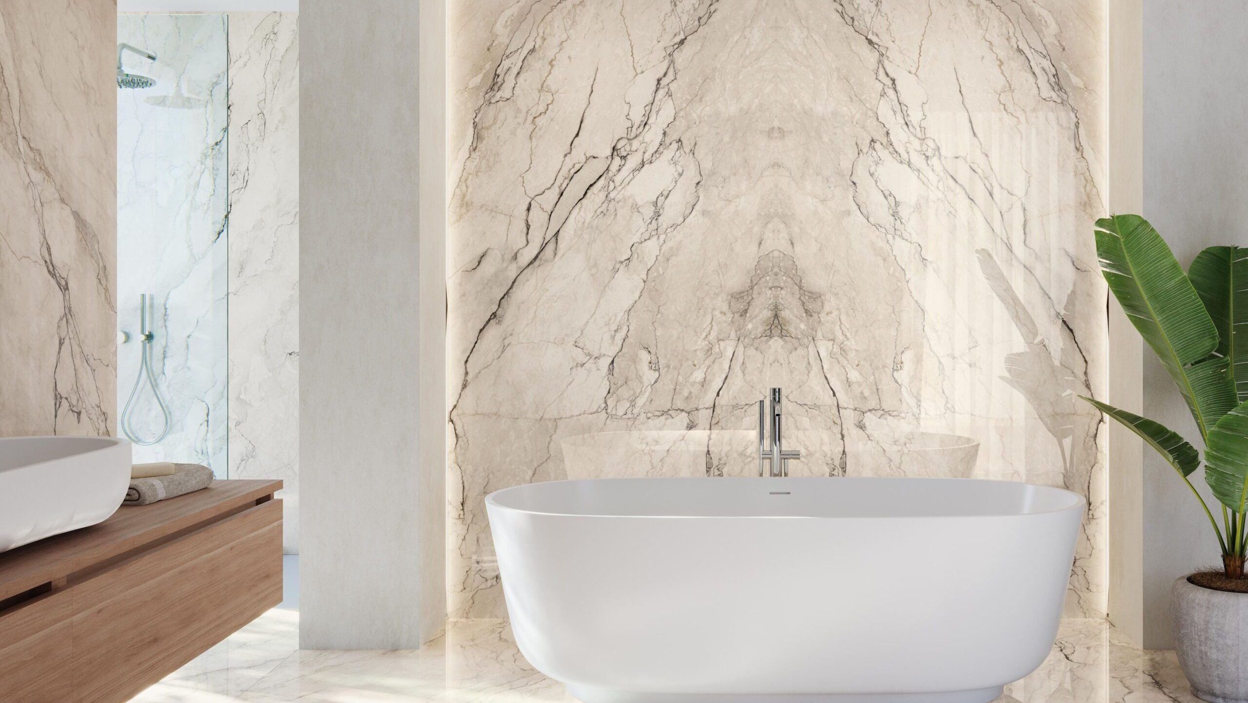 Modern bathroom with a freestanding bathtub, marble walls, a wooden vanity with a vessel sink, a shower area with a glass wall, and a large potted plant.