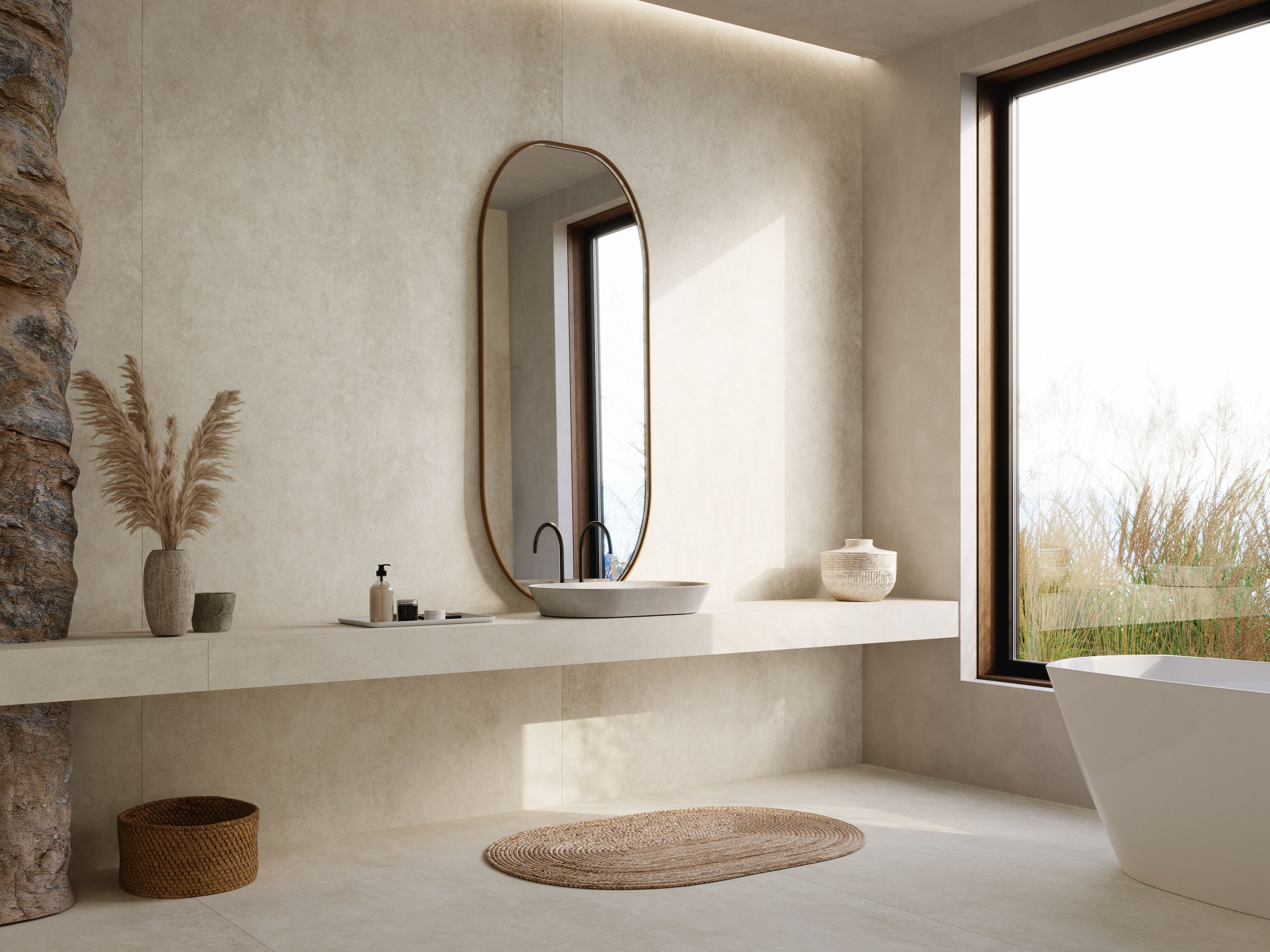 Modern bathroom with beige walls, a large window, a white bathtub, a floating vanity with a vessel sink, a mirror, and decorative vases and baskets.
